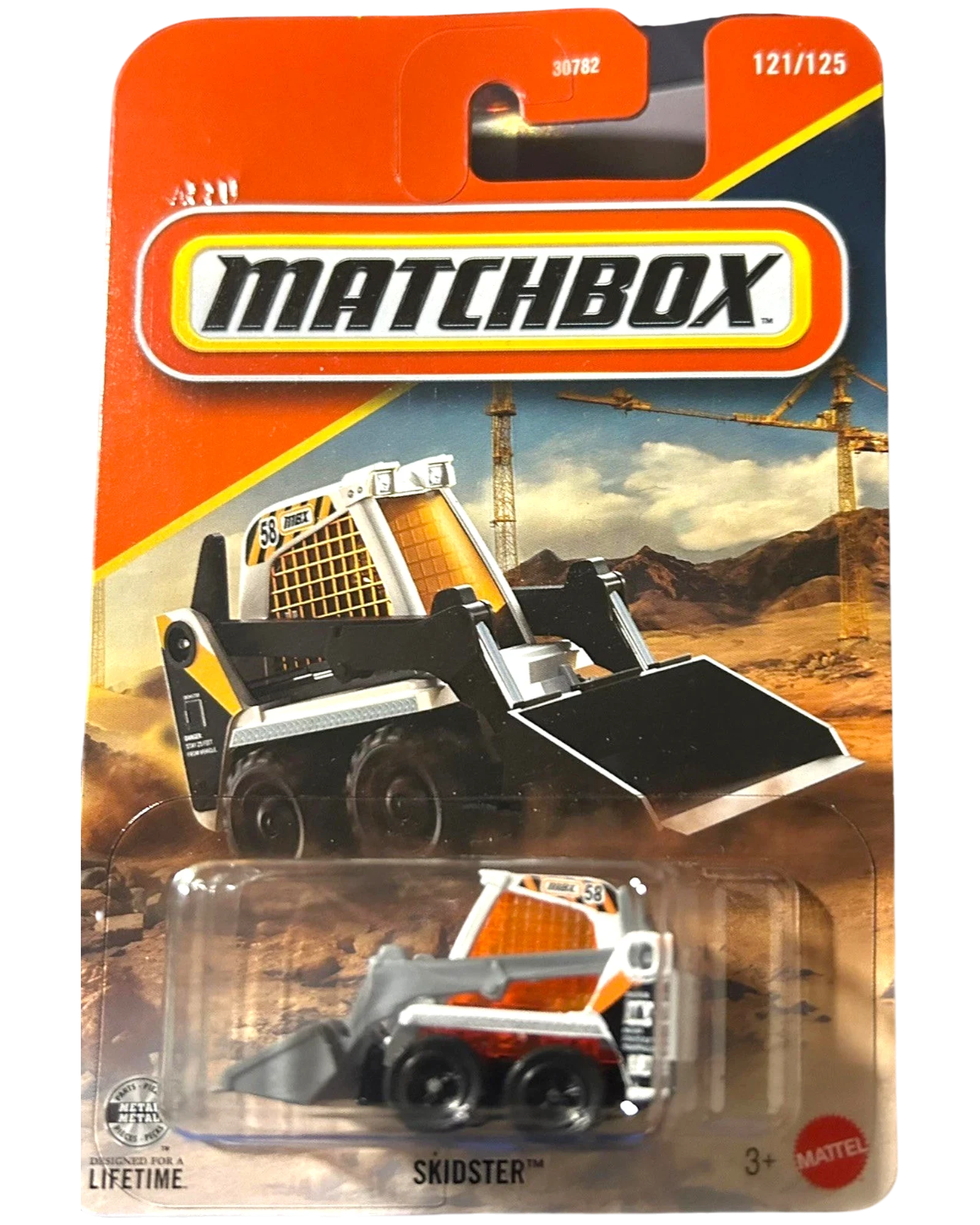 More Than Diecast Matchbox MBX Skidster 1:64 scale die-cast construction vehicle in white, orange, and black with a front loader.