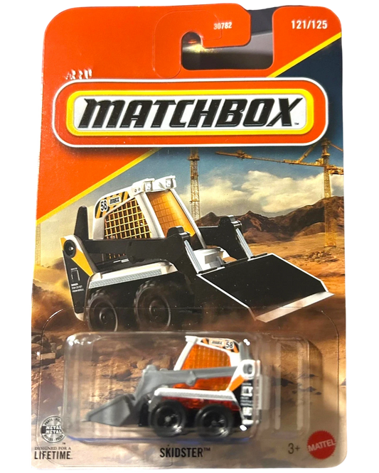 More Than Diecast Matchbox MBX Skidster 1:64 scale die-cast construction vehicle in white, orange, and black with a front loader.