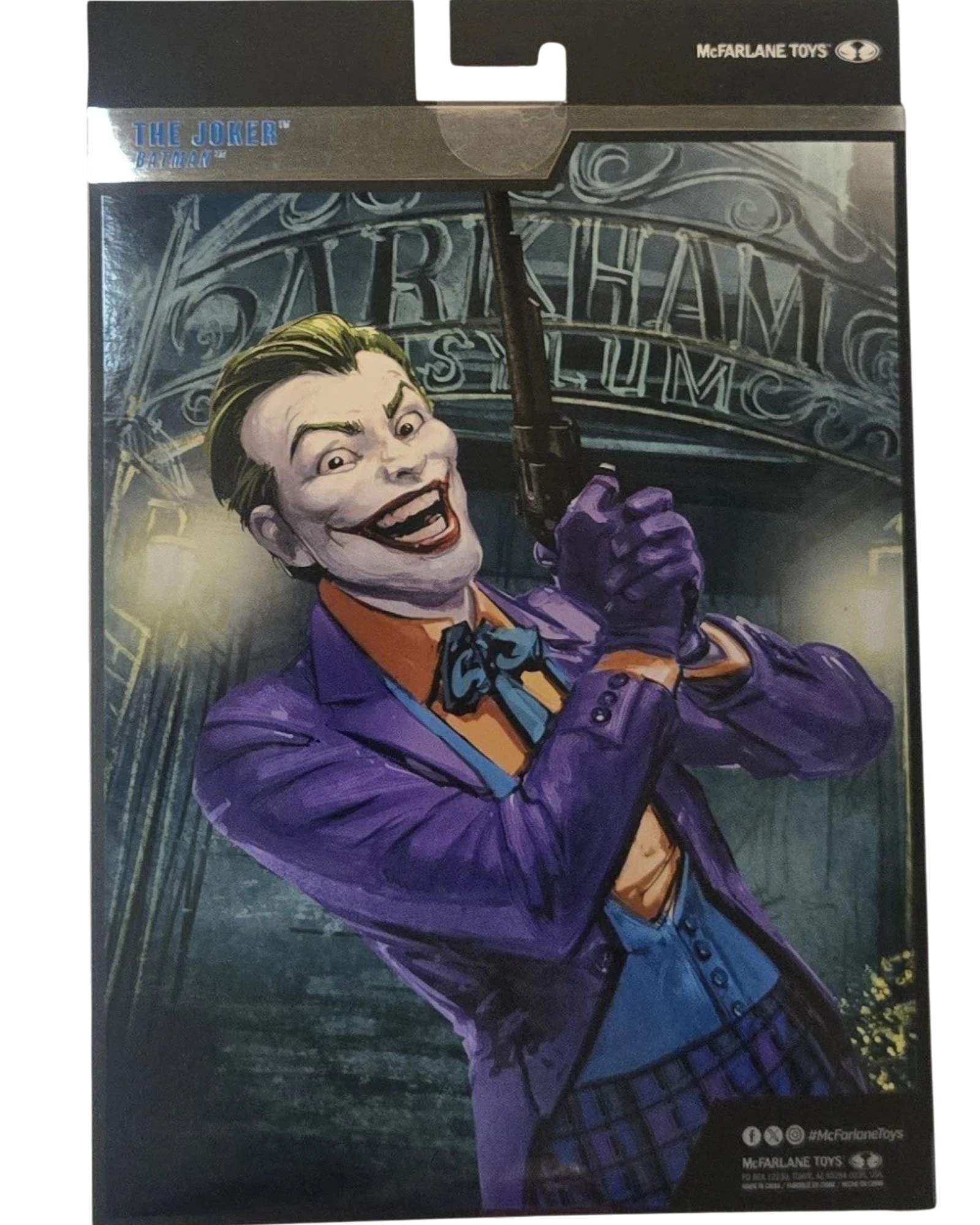 More Than Diecast McFarlane DC Multiverse Joker Batman 7-inch collector edition figure in box. Features purple suit, blue vest, orange shirt, and blue bow tie.
