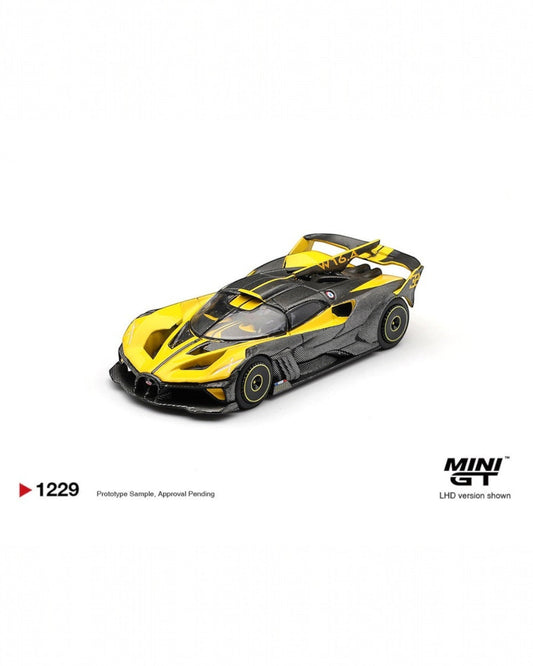 More Than Diecast: 1:64 scale yellow and black Bugatti Bolide die-cast model with carbon fiber accents.