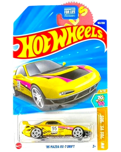More Than Diecast 1995 Mazda RX-7 drift car in bright yellow with pink and black racing stripes, 1:64 scale die-cast.