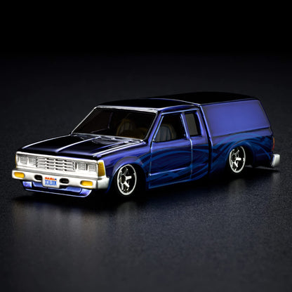Hot Wheels RLC Exclusive 1986 Nissan 720 King Cab Spectraflame Steel Blue 1:64 Die-Cast JJY64-9893