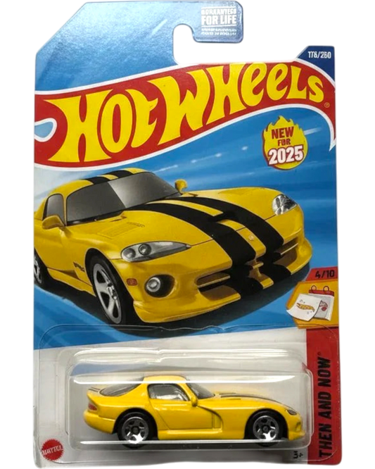 Hot Wheels toy car in packaging with a yellow and black striped car design.