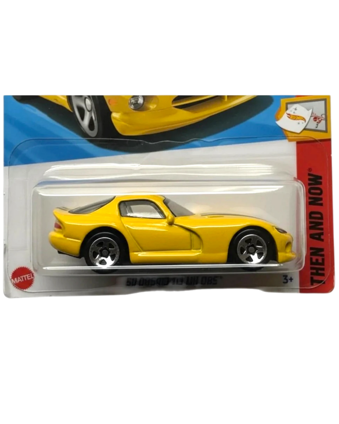 Yellow toy car in packaging with a visible Mattel logo.