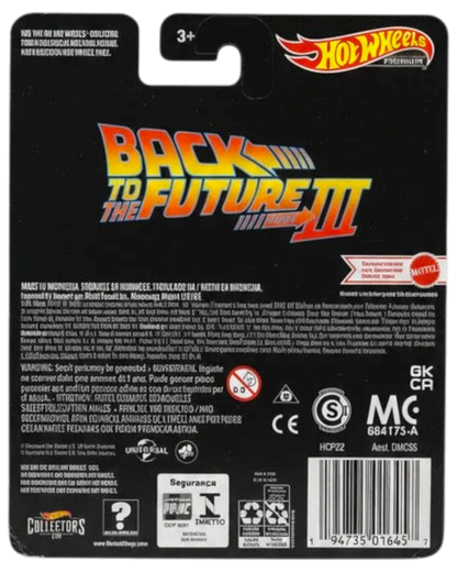 Back of a Hot Wheels toy packaging with 'Back to the Future III' branding on a wooden surface.