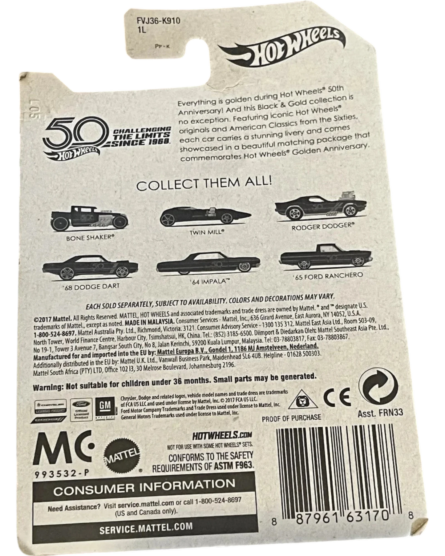 Hot Wheels packaging with car illustrations and text on a wooden surface