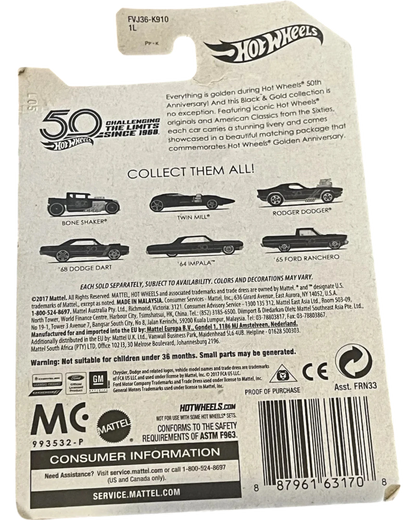 Hot Wheels packaging with car illustrations and text on a wooden surface