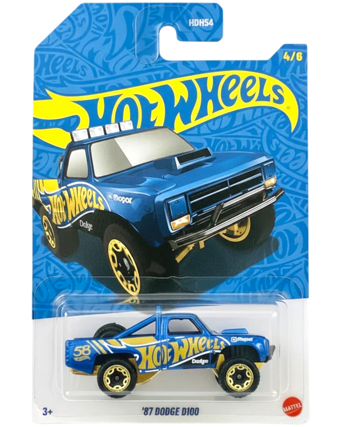 Hot Wheels '87 Dodge D100 toy car in packaging on a white background