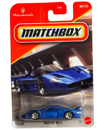 More Than Diecast Matchbox Maserati MC12 die-cast car in metallic blue on a blister card packaging