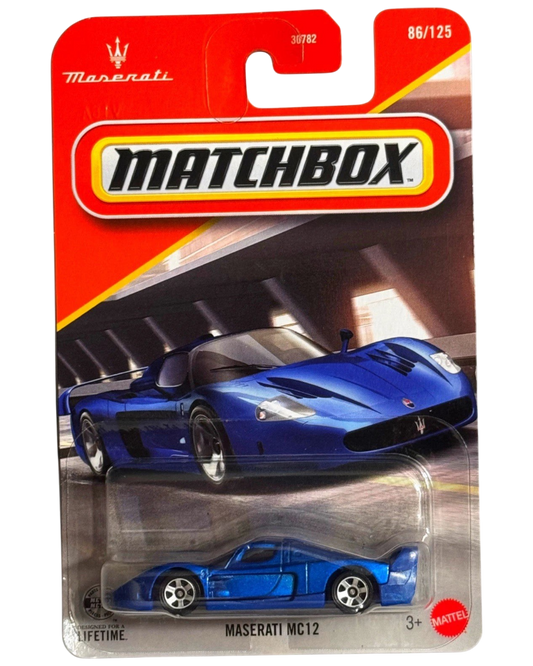 More Than Diecast Matchbox Maserati MC12 die-cast car in metallic blue on a blister card packaging
