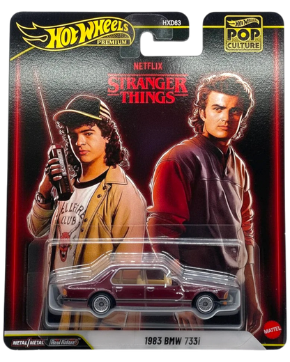 Hot Wheels Stranger Things action figure packaging with two characters and a car.