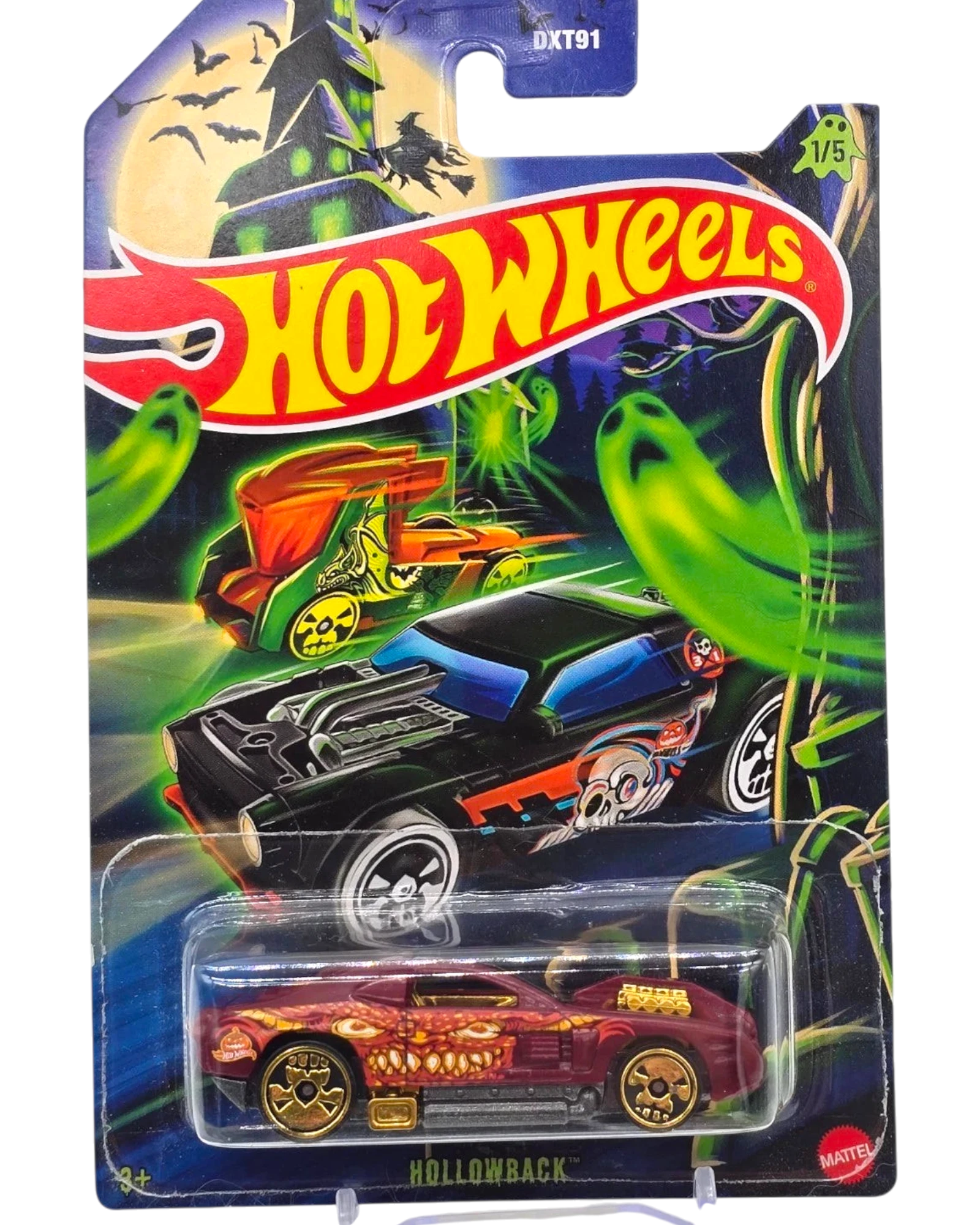 Hot Wheels toy car in packaging with Halloween-themed background