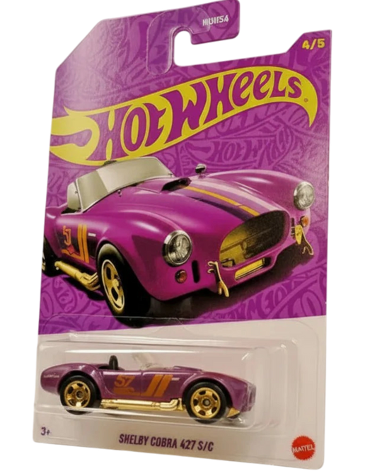 Hot Wheels Shelby Cobra 427 S/C toy car in purple packaging on a gray background