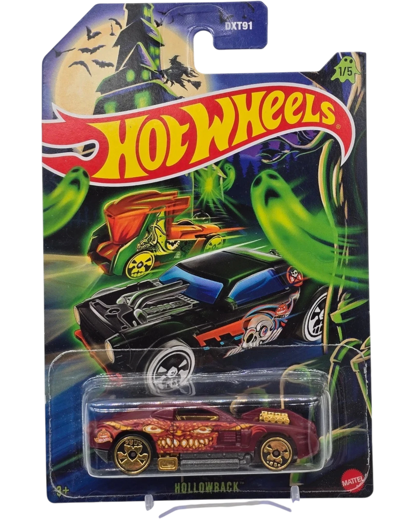 Hot Wheels toy car in packaging with Halloween-themed background