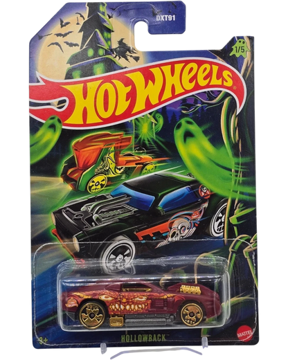 Hot Wheels toy car in packaging with Halloween-themed background